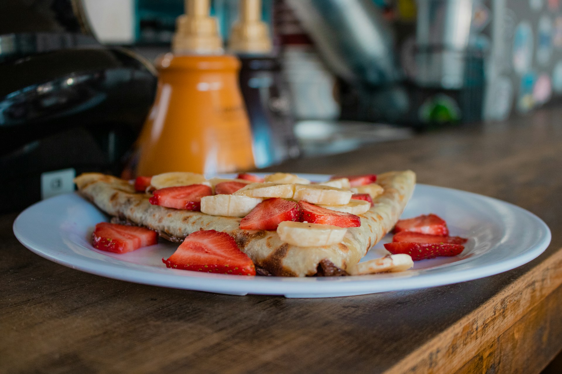 Crepe with bananas and strawberries