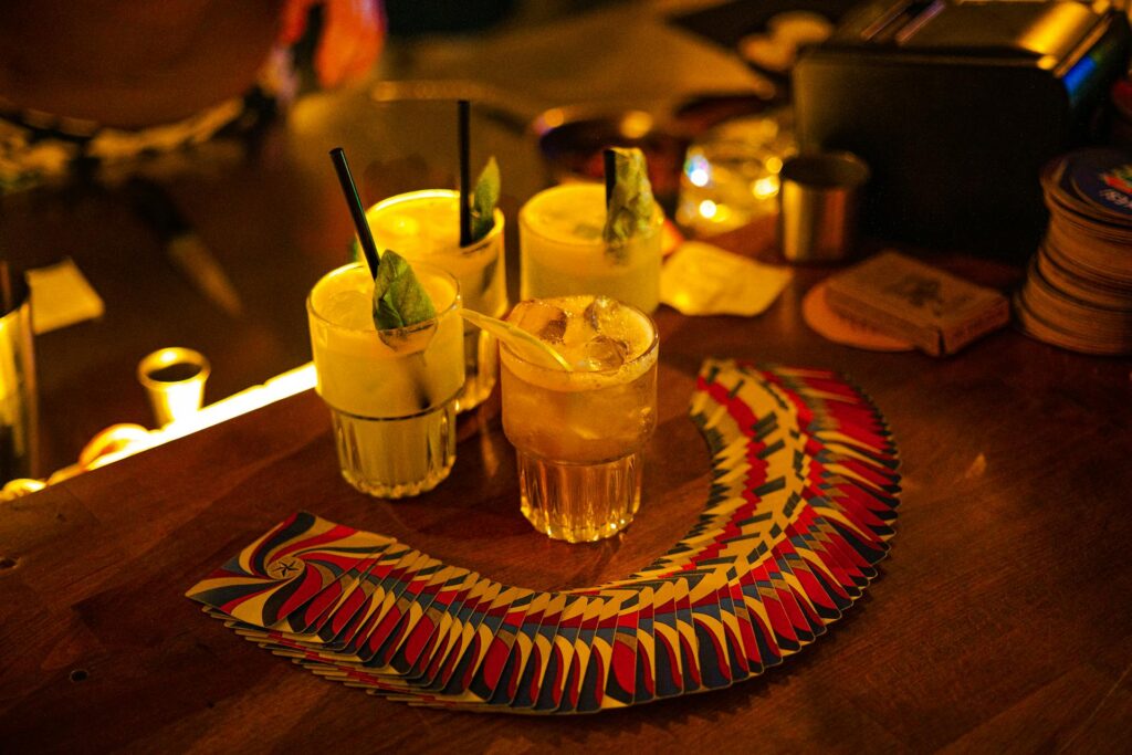 Cocktails and playing cards on a table